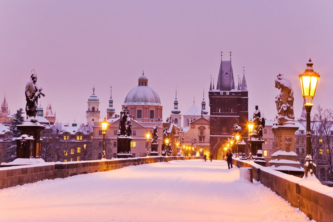 Snow along Charles Bridge Prague