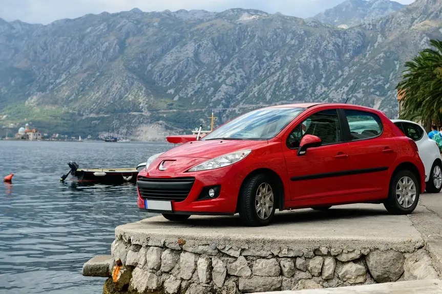 Car parked up on Kotor Bay in Kotor, Montenegro