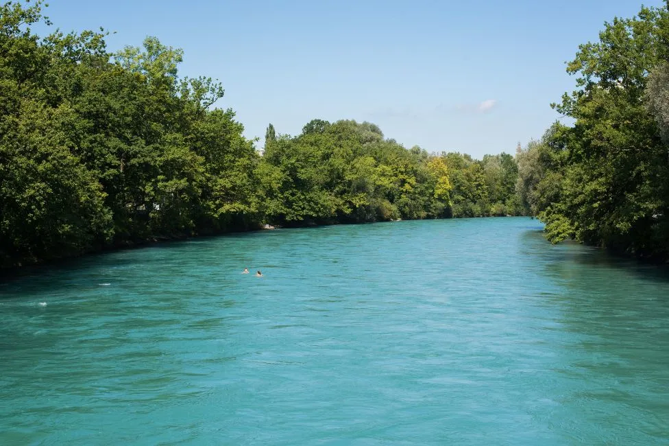 People swimming in the Aare River in Bern