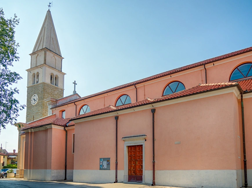 Outside exterior of Church of St. Maurus and The Bell Tower in Izola, Slovenia